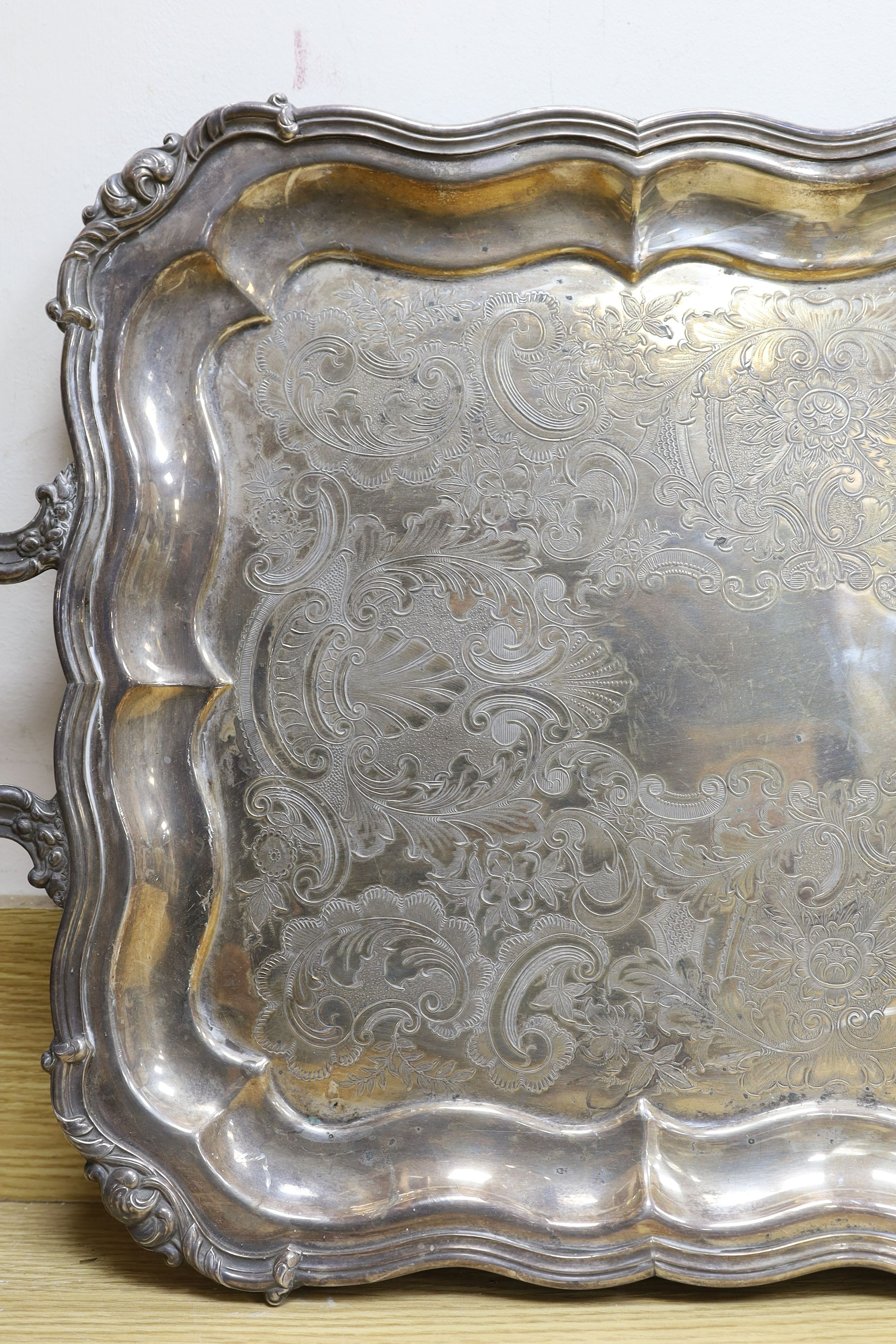 A large plated two-handled tray - 71cm long